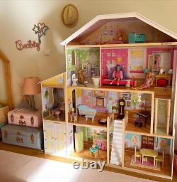KidKraft Majestic Mansion Wooden Dollhouse with 34 Pcs, Elevator, Garage, Gift 3+