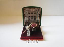 Miniature items, hat, base, umbrella, shawl, framed picture on the wood frame