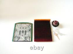 Miniature items, hat, base, umbrella, shawl, framed picture on the wood frame