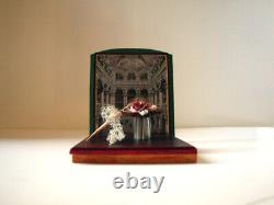 Miniature items, hat, base, umbrella, shawl, framed picture on the wood frame